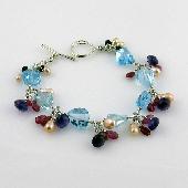 Blue Topaz Bracelet With Pink Sapphire and Pearl Dangles